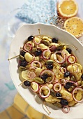 Potato salad with onions, olives, capers, fennel seeds
