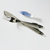 Fish cutlery (knife & fork with fish decoration) and knife rest