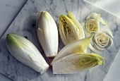 Chicory, whole and sliced, on marble board