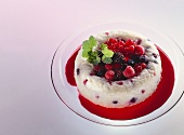 Rice pudding with mixed berries & blackberry sauce