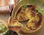 Chard quiche with shrimps and sprigs of dill