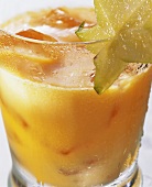 Exotic fruit on the rocks with carambola on glass & ice cubes