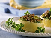 Potatoes stuffed with savoy, bacon and herbs