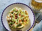 Mashed potato with endive and diced bacon