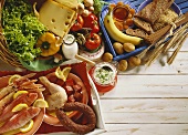 Still life with fish, meat, vegetables, bread & dairy products