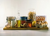 Still life with various foods on wooden board