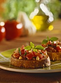Bruschetta (Toasted bread with nuts and tomatoes, Italy)
