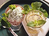Spicy tomato cocktail with herb cream topping & carrot drink