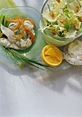 Plaice fillet with potato salad; curly endive; rice waffle