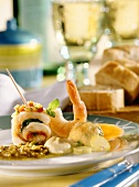 Fish fondue with plaice rolls, fish balls and shrimp