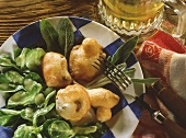 Bavarian mushroom fondue in beer batter with corn salad