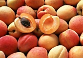 Several Apricots; One Halved