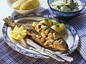 Trout stuffed with herbs and flaked almonds