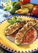Courgettes stuffed with lamb in tomato sauce on plate