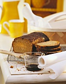 Finnish malt bread on cake rack; syrup for glazing