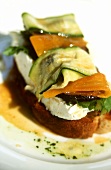 Crostini topped with cheese and courgettes