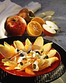 Chicory salad with apples, oranges and pumpkin seeds