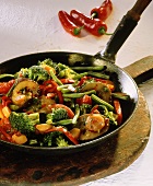 Vegetable chili with broccoli and aubergines in a pan