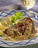 Beef roulades with horseradish & ribbon noodles on plate