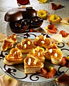 Puff pastry hearts with jam and almonds; Pralines