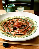 Salmon and sesame carpaccio with chives & cucumber