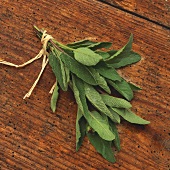 A bunch of sage on wooden background