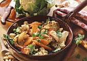 Vegetable stir-fry with cauliflower carrots and chicken 
