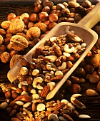 Various nuts on a wooden scoop