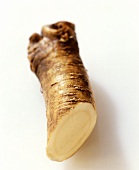 Horseradish, cut into, on a white background