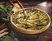 Whole asparagus quiche with mangetouts and herbs