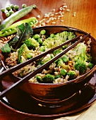Hearty vegetable rice with broccoli & peas in a bowl