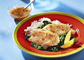 Steamed cod on bed of spinach