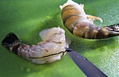 Removing the intestinal vein from a raw shrimp