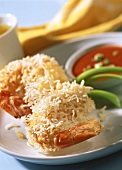 Wrapped shrimps with glass noodles on plate; tomato dip