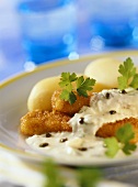 Fish fingers with yoghurt remoulade & potatoes in their skins