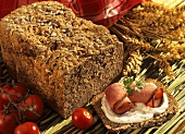 Wholemeal rye bread and slice of bread with ham