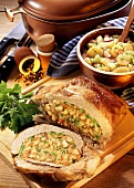 Veal breast with colourful stuffing; potato salad