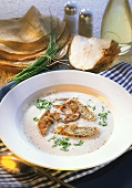 Cream of celery soup with soup pancakes (Flädle) & chives