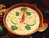 Asian chicken and coconut milk soup with limes