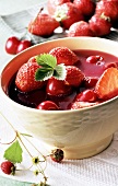 Cold soup with cherries and strawberries