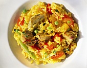 Vegetable paella with artichokes, tomatoes & peas