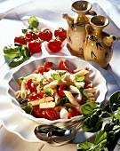 Pasta caprese (pasta salad with tomatoes, mozzarella, basil)