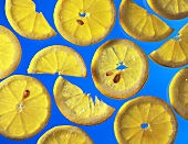 Lemon slices on blue background