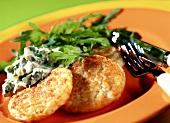 Rosti with cheese mousse and rocket