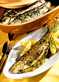 Stuffed trout with herb butter cooked in Römertopf