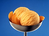 Apricot ice cream with apricot wedges