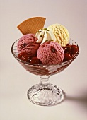 Cherry and vanilla ice cream with cream and wafer
