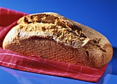 Barley mixture bread on red tea towel