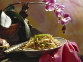 Egg noodles with soya bean sprouts and spring onions