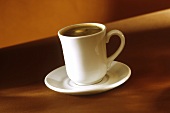Coffee in tall white cup